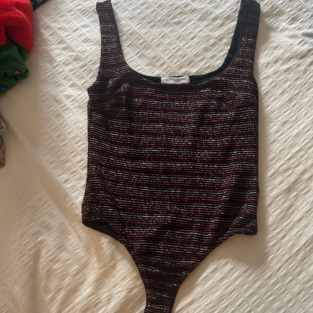 Body with metallic rainbow stripes